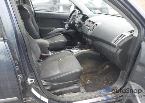 2009 Mitsubishi Outlander Se z USA, uszkodzony, nr VIN JA4LT31W39Z010212